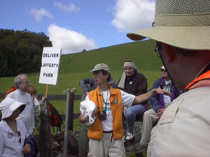 Bruce unfolds the quilt material.