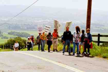 The group crests the rise just before the Lafferty gate.